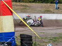 Wilfred Detz and Britget Portijk of the Netherlands come to grief in the Sidecar Support Class during the FIM Long Track World Championship...