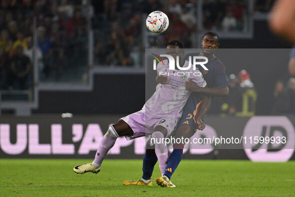 Keinan Davis of Udinese Calcio and Evan Ndicka of A.S. Roma are in action during the 5th day of the Serie A Championship between A.S. Roma a...