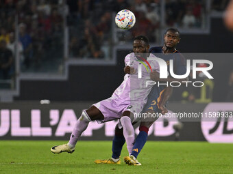 Keinan Davis of Udinese Calcio and Evan Ndicka of A.S. Roma are in action during the 5th day of the Serie A Championship between A.S. Roma a...