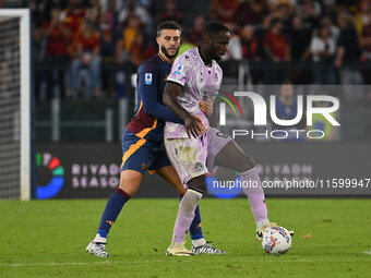 Mario Hermoso of A.S. Roma and Keinan Davis of Udinese Calcio are in action during the 5th day of the Serie A Championship between A.S. Roma...