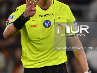 Referee Ermanno Feliciani officiates during the 5th day of the Serie A Championship between A.S. Roma and Udinese Calcio at the Olympic Stad...