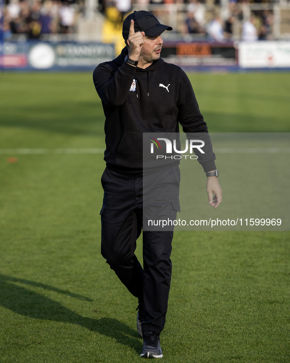 Barrow manager Stephen Clemence gestures to their fans after the Sky Bet League 2 match between Barrow and Newport County at Holker Street i...