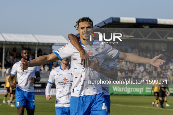 Theo Vassell celebrates after scoring Barrow's second goal during the Sky Bet League 2 match between Barrow and Newport County at Holker Str...