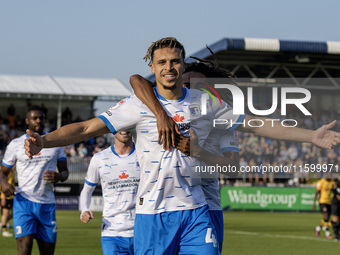 Theo Vassell celebrates after scoring Barrow's second goal during the Sky Bet League 2 match between Barrow and Newport County at Holker Str...