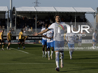 Theo Vassell celebrates after scoring Barrow's second goal during the Sky Bet League 2 match between Barrow and Newport County at Holker Str...