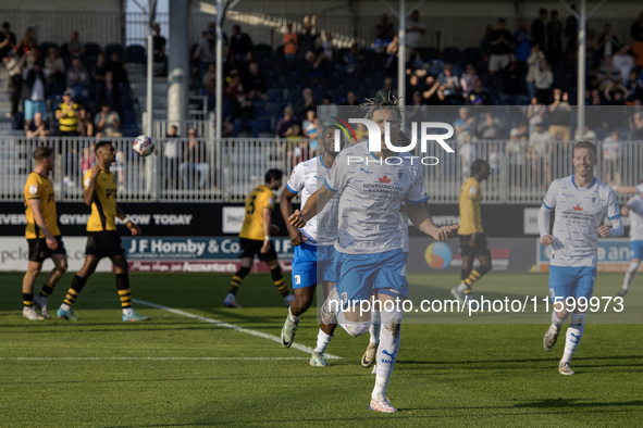 Theo Vassell celebrates after scoring Barrow's second goal during the Sky Bet League 2 match between Barrow and Newport County at Holker Str...