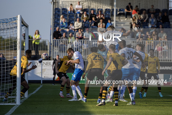 Barrow's Theo Vassell scores their second goal with a header during the Sky Bet League 2 match between Barrow and Newport County at Holker S...