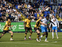 Barrow's Katia Kouyate is in action during the Sky Bet League 2 match between Barrow and Newport County at Holker Street in Barrow-in-Furnes...