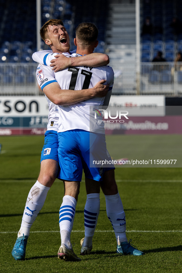 Elliot Newby of Barrow celebrates with Ged Garner after scoring their first goal during the Sky Bet League 2 match between Barrow and Newpor...