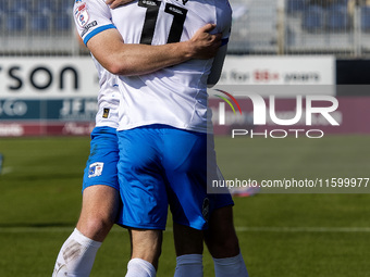 Elliot Newby of Barrow celebrates with Ged Garner after scoring their first goal during the Sky Bet League 2 match between Barrow and Newpor...