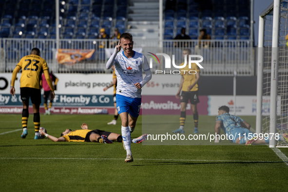 Elliot Newby of Barrow celebrates after scoring their first goal during the Sky Bet League 2 match between Barrow and Newport County at Holk...