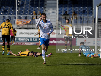 Elliot Newby of Barrow celebrates after scoring their first goal during the Sky Bet League 2 match between Barrow and Newport County at Holk...