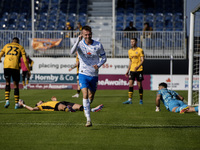 Elliot Newby of Barrow celebrates after scoring their first goal during the Sky Bet League 2 match between Barrow and Newport County at Holk...