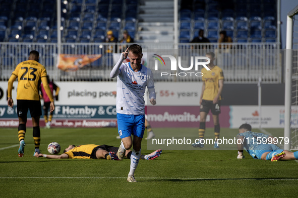 Elliot Newby of Barrow celebrates after scoring their first goal during the Sky Bet League 2 match between Barrow and Newport County at Holk...