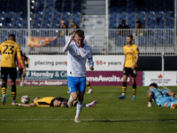 Elliot Newby of Barrow celebrates after scoring their first goal during the Sky Bet League 2 match between Barrow and Newport County at Holk...