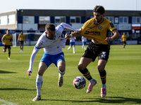 Elliot Newby of Barrow battles with Anthony Glennon of Newport County during the Sky Bet League 2 match between Barrow and Newport County at...