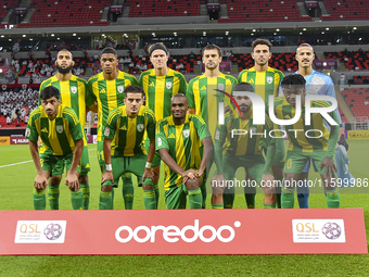 Al Wakrah SC players pose for a team photo before the Ooredoo Qatar Stars League 24/25 match between Al Rayyan SC and Al Wakrah SC at Ahmad...