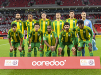 Al Wakrah SC players pose for a team photo before the Ooredoo Qatar Stars League 24/25 match between Al Rayyan SC and Al Wakrah SC at Ahmad...