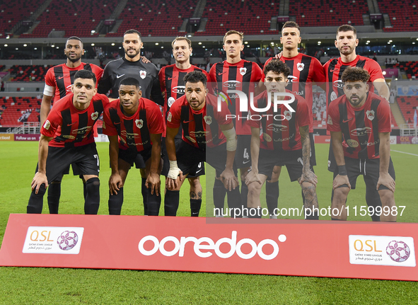 Al Rayyan SC players pose for a team photo before the Ooredoo Qatar Stars League 24/25 match between Al Rayyan SC and Al Wakrah SC at Ahmad...