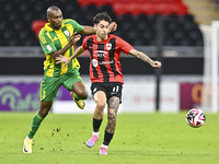 Abdelkarim Hassan of Al Wakrah SC battles for the ball with Gabriel Pereira of Al Rayyan SC during the Ooredoo Qatar Stars League 24/25 matc...