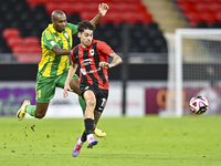 Abdelkarim Hassan of Al Wakrah SC battles for the ball with Gabriel Pereira of Al Rayyan SC during the Ooredoo Qatar Stars League 24/25 matc...