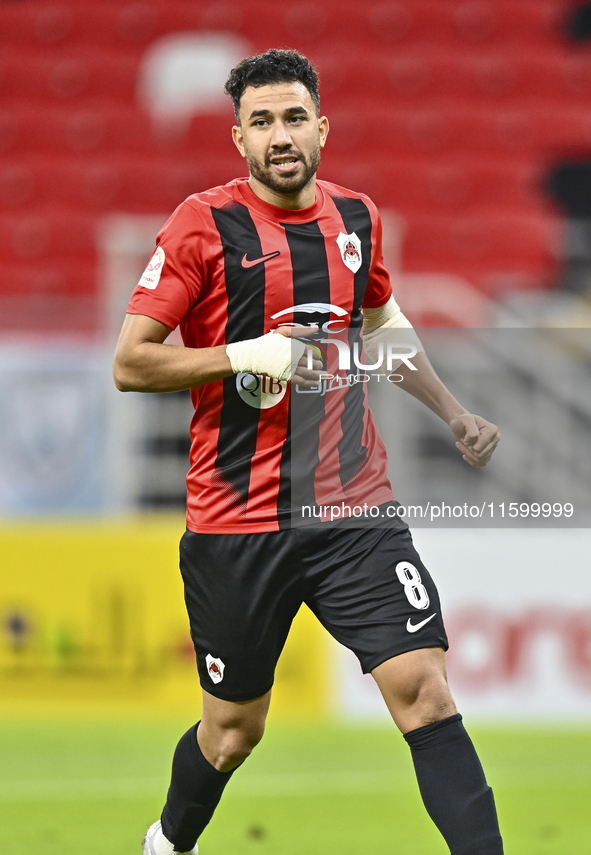 Mahmoud Hassan of Al Rayyan SC plays in the Ooredoo Qatar Stars League 24/25 match between Al Rayyan SC and Al Wakrah SC at Ahmad Bin Ali St...