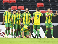 Jacinto Dala (3-L) of Al Wakrah SC celebrates after scoring a goal during the Ooredoo Qatar Stars League 24/25 match between Al Rayyan SC an...