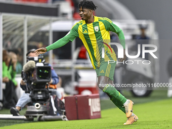 Jacinto Dala of Al Wakrah SC celebrates after scoring a goal during the Ooredoo Qatar Stars League 24/25 match between Al Rayyan SC and Al W...