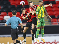 Ricardo Jorge Gomes (R) of Al Wakrah SC battles for the ball with Andre Fonseca Amaro (L) of Al Rayyan SC during the Ooredoo Qatar Stars Lea...