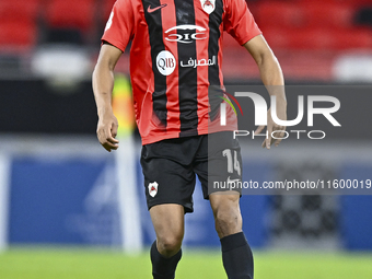 Adel Bader Al-Ahmad (#14) of Al Rayyan SC plays in the Ooredoo Qatar Stars League 24/25 match between Al Rayyan SC and Al Wakrah SC at Ahmad...