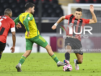 Omar Salah Alosad (L) of Al Wakrah SC battles for the ball with Andre Fonseca Amaro (R) of Al Rayyan SC during the Ooredoo Qatar Stars Leagu...