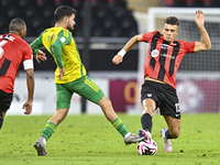 Omar Salah Alosad (L) of Al Wakrah SC battles for the ball with Andre Fonseca Amaro (R) of Al Rayyan SC during the Ooredoo Qatar Stars Leagu...