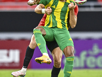 Ricardo Jorge Gomes (R) of Al Wakrah SC battles for the ball with Andre Fonseca Amaro of Al Rayyan SC during the Ooredoo Qatar Stars League...