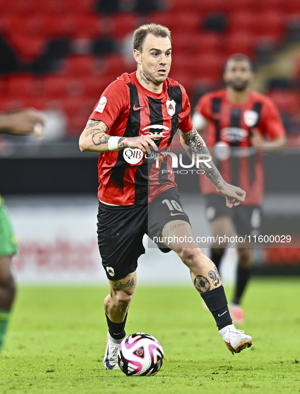 Roger Krug Guedes (#10) of Al Rayyan SC plays in the Ooredoo Qatar Stars League 24/25 match between Al Rayyan SC and Al Wakrah SC at Ahmad B...