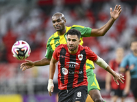 Abdelkarim Hassan of Al Wakrah SC battles for the ball with Mahmoud Hassan of Al Rayyan SC during the Ooredoo Qatar Stars League 24/25 match...