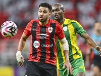 Abdelkarim Hassan of Al Wakrah SC battles for the ball with Mahmoud Hassan of Al Rayyan SC during the Ooredoo Qatar Stars League 24/25 match...