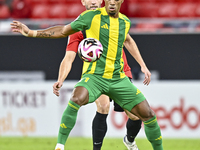 Ricardo Jorge Gomes of Al Wakrah SC battles for the ball with David Garcia of Al Rayyan SC during the Ooredoo Qatar Stars League 24/25 match...