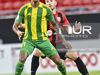 Ricardo Jorge Gomes of Al Wakrah SC battles for the ball with David Garcia of Al Rayyan SC during the Ooredoo Qatar Stars League 24/25 match...