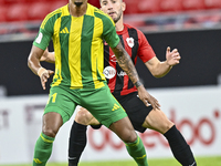 Ricardo Jorge Gomes of Al Wakrah SC battles for the ball with David Garcia of Al Rayyan SC during the Ooredoo Qatar Stars League 24/25 match...