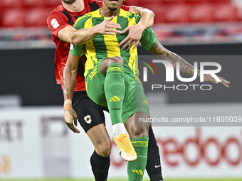 Ricardo Jorge Gomes of Al Wakrah SC battles for the ball with David Garcia of Al Rayyan SC during the Ooredoo Qatar Stars League 24/25 match...