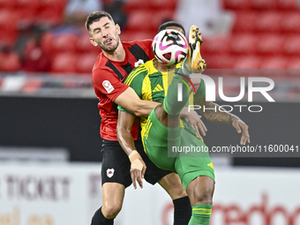 Ricardo Jorge Gomes of Al Wakrah SC battles for the ball with David Garcia of Al Rayyan SC during the Ooredoo Qatar Stars League 24/25 match...