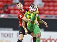 Ricardo Jorge Gomes of Al Wakrah SC battles for the ball with David Garcia of Al Rayyan SC during the Ooredoo Qatar Stars League 24/25 match...