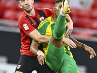 Ricardo Jorge Gomes of Al Wakrah SC battles for the ball with David Garcia of Al Rayyan SC during the Ooredoo Qatar Stars League 24/25 match...