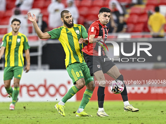 Aissa Belal Laidouni of Al Wakrah SC battles for the ball with Achraf Bencharki of Al Rayyan SC during the Ooredoo Qatar Stars League 24/25...