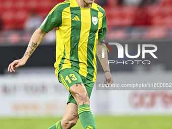 Alexander Scholz (#13) of Al Wakrah SC plays in the Ooredoo Qatar Stars League 24/25 match between Al Rayyan SC and Al Wakrah SC at Ahmad Bi...