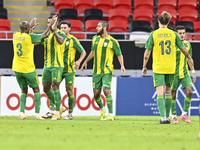 Ricardo Jorge Gomes (2-L) of Al Wakrah SC celebrates after scoring a goal during the Ooredoo Qatar Stars League 24/25 match between Al Rayya...