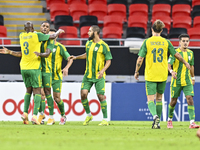 Ricardo Jorge Gomes (2-L) of Al Wakrah SC celebrates after scoring a goal during the Ooredoo Qatar Stars League 24/25 match between Al Rayya...