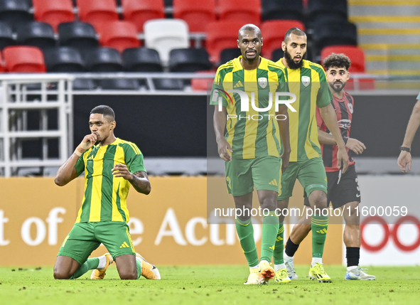 Ricardo Jorge Gomes (L) of Al Wakrah SC celebrates after scoring a goal during the Ooredoo Qatar Stars League 24/25 match between Al Rayyan...