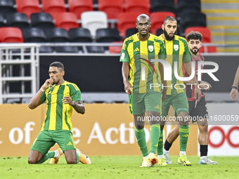 Ricardo Jorge Gomes (L) of Al Wakrah SC celebrates after scoring a goal during the Ooredoo Qatar Stars League 24/25 match between Al Rayyan...