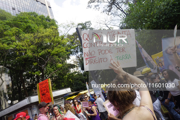 Protestors march for climate justice and against wildfires affecting the entire country in Sao Paulo, Brazil, on September 22, 2024. 